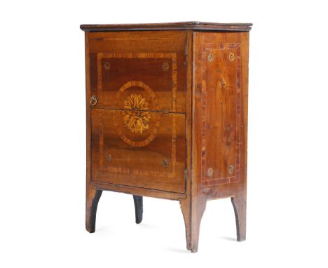 A late 18th century Italian walnut commodino, the formerly hinged top inlaid with banding and rondels, above a conforming cup