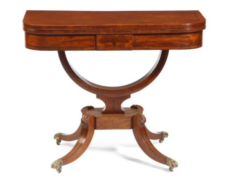 A Regency mahogany card table, inlaid with banding, the 'D'-shaped swivel and fold-over top on a 'U'-shaped support, on leaf 