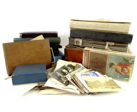 A quantity of early 20thC postcards, cuttings, photographs, cigarette cards, etc.