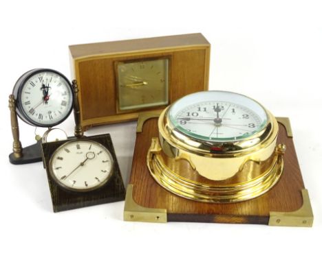 Miscellaneous clocks etc., to include a Cuarzo bulkhead type clock, Kienzle travelling clock, alarm clock and an Elliott cloc