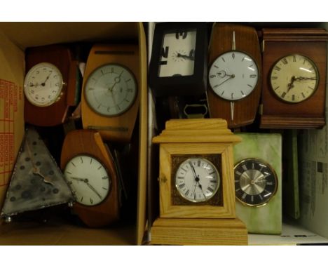 A large quantity of mainly battery operated, some clockwork mantel clocks and timepieces, to include some novelty pieces. (2 