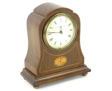 An Edwardian mahogany and marquetry mantel timepiece, the white enamel dial stamped Mandah, Rhodes and Sons Limited Bradford,