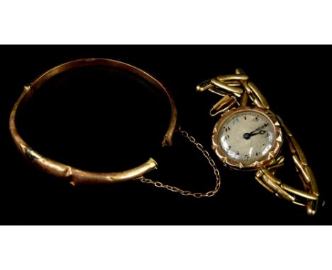 Two items of jewellery, to include a ladies wristwatch with 9ct gold circular watch head and gold plated expanding bracelet, 