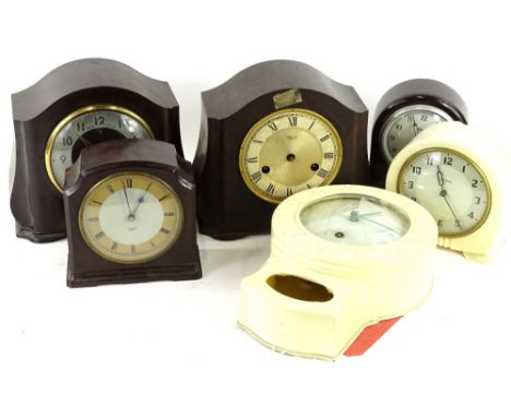 A collection of Bakelite clocks, to include a Smiths Enfield example in brown case, a Smiths drop dial type wall clock etc. (