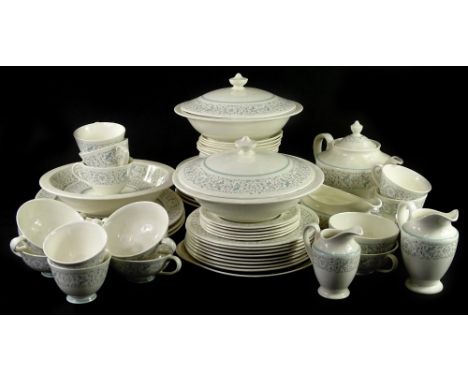 A Royal Doulton arabesque pattern part dinner and tea service, to include two tureens and covers, teapot etc.