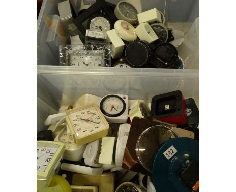 A large quantity of digital and quartz mantel clocks alarm clocks etc., (3 boxes)Provenance: This timepiece formed part of Lu