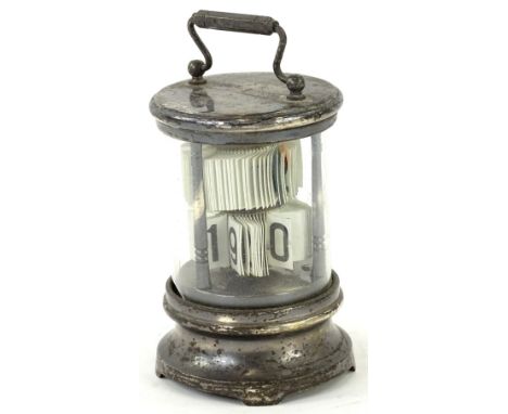 A late 19th/early 20thC carriage type clock, of cylindrical form with revolving numerals, (AF), 16cm H.Provenance: This timep