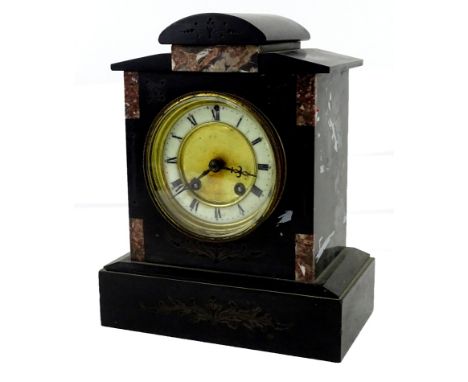 A French black slate and marble mantel clock, with a domed top, the enamel type dial with Roman Numerals, 27cm H.Provenance: 