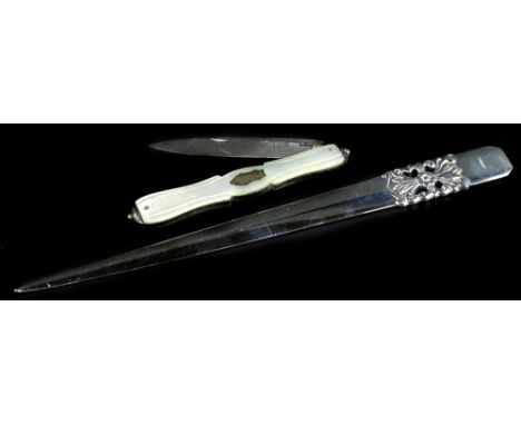 A modern silver paper knife, with pierced floral handle and a mother of pearl fruit knife with silver blade. (2)