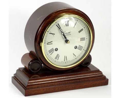 A modern mahogany mantel clock by Comitti of London, on a rectangular base, 21cm W.