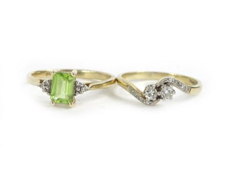 Two 9ct gold dress rings, to include a 9ct gold and diamond set twist ring, and a 9ct gold peridot and cz stone ring, 4.5g al