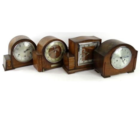 Four mantel clocks, to include a Westminster chime example with presentation plaque, an Art Deco shaped Smiths Westminster ch