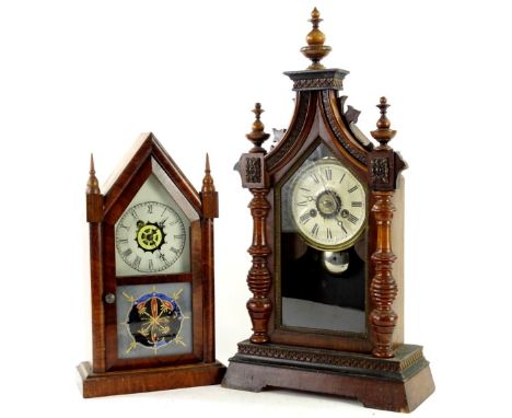 Two American mantel clocks, each with turned finials, painted dial, 56cm &amp; 38cm H respectively.Provenance: This timepiece