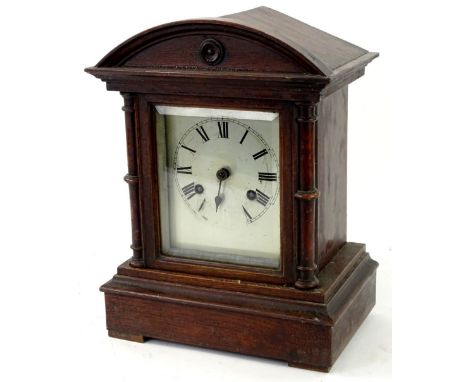 A late 19thC German oak cased mantel clock, the pointed dial with Roman numerals, 34cm H.Provenance: This timepiece formed pa