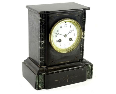 A French black slate mantel clock, the white enamel dial with Arabic numerals, 25cm H.Provenance: This timepiece formed part 
