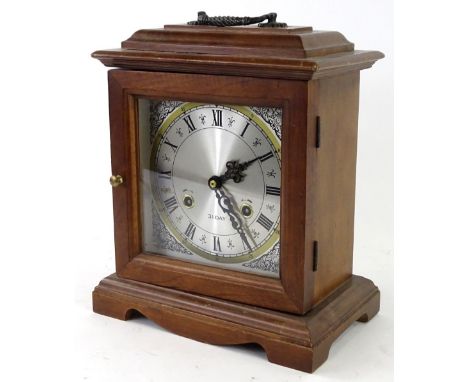 A German mahogany mantel clock in George III style, with brass movement, 32cm H.Provenance: This timepiece formed part of Luk