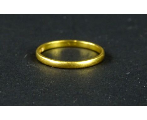 A 22ct gold wedding band, of plain design, ring size P, 2g all in. 