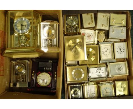A quantity of brass mainly battery operated carriage type clocks and mantel clocks etc.Provenance: This timepiece formed part