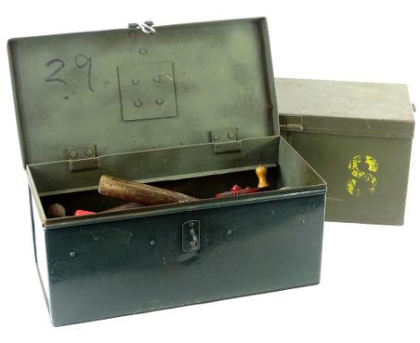 A quantity of tools, various types in green metal containers.