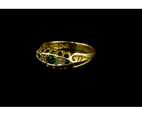 An 18ct gold emerald and diamond gypsy ring, with scroll design head, ring size N½, 2.5g all in. 