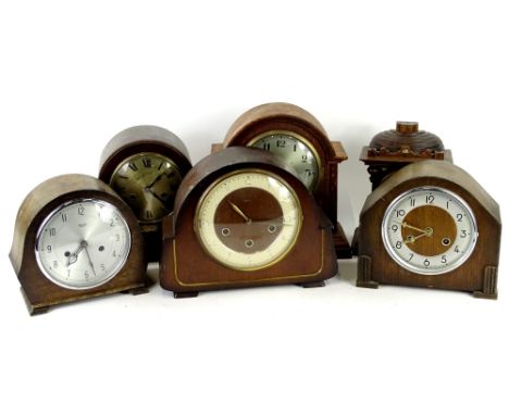 Six various mantel clocks, to include an early 20thC example in an oak case, a Continental timepiece with paper dial possibly