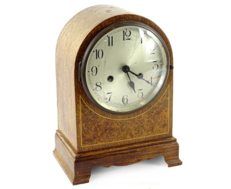 An early 20thC mahogany and burr yew mantel clock, the silvered dial with Roman numerals, 30cm H.Provenance: This timepiece f