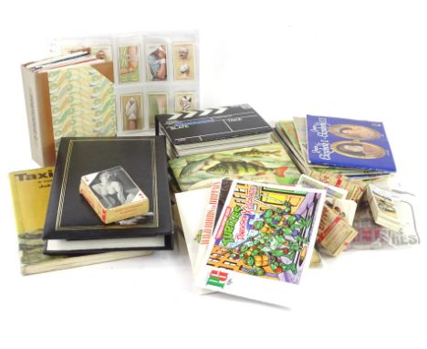 Miscellaneous ephemera etc., to include cigarette cards, modern postcards, book on taxidermy, Happy Families game etc.
