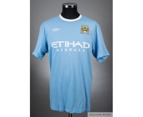 Emanuel Adebayor sky blue Manchester City no.25 home jersey from the 2009-10 South African Tour which saw City compete in the