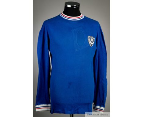 Blue Portsmouth no.4 home jersey, circa 1967,
Umbro, long-sleeved with elasticated white round neck collar and cuffs with red