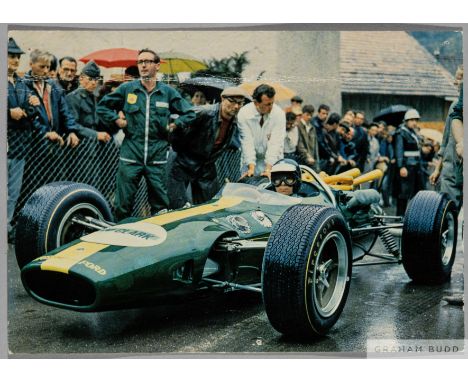 Very rare and sort after autograph of British race car driver Jim Clark,
signed in ink on back of postcard which shows Jim Cl