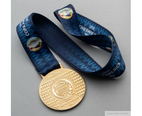 A gilt-metal 2021 Copa America Winner's medal, 
the obverse inscribed Al Campeon, Conmebol, Copa America 2021, the reverse in
