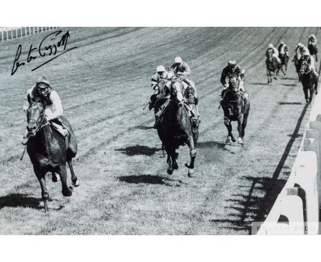 Lester Piggott signed b&amp;w photograph,
depicting the legendary jockey passing the winning post aboard Nijinsky in the 1970