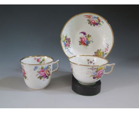 A Spode Trio in New Dresden shape with relief moulded and enamel floral decoration, c. 1816. Sold with sales receipt from 198