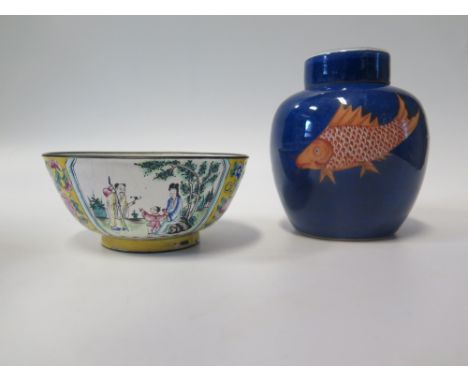 A Chinese Ginger Jar decorated with three fish on a blue ground 15.5 cm and damaged enamel bowl