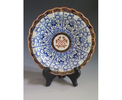 A First Period Worcester Lobed Plate decorated in the Royal Lily pattern, c. 1770, unmarked, 16 cm. With sales receipt dated 