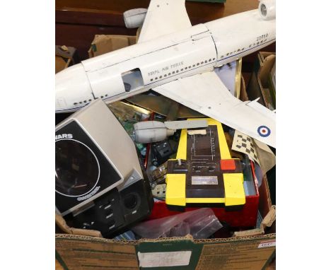 One box of mixed wooden aircraft modelling spare parts together with an electronic computer game, and a quantity of military 