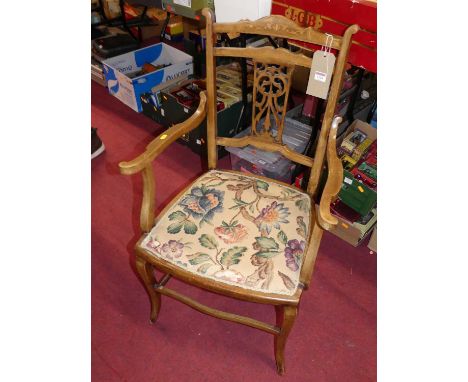 An Edwardian mahogany and satin wood inlaid pierced splat back elbow chair with floral tapestry fixed pad seat, width 55cm