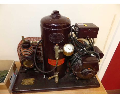 An Aerograph Devilbiss spray finishing equipment, boxed compressor and engine system