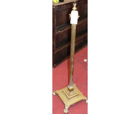 A brass corinthian column standard lamp, on square stepped base, height 124cm