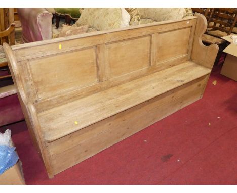 A rustic pine three-panelled long bench settle, width 190cm