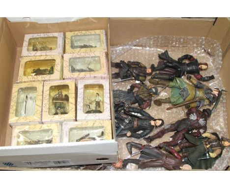 Two boxes of Lord of the Rings action figures