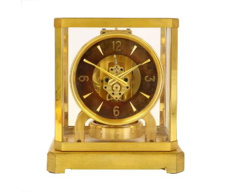 A Brass Atmos Clock, signed Jaeger LeCoultre, 20th Century, five glass panelled case, base with balance release lever, base w