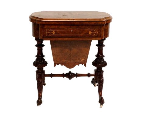 A Victorian Figured Burr Walnut and Marquetry-Inlaid Games/Work Table, circa 1870, the quarter-veneered hinged lid enclosing 