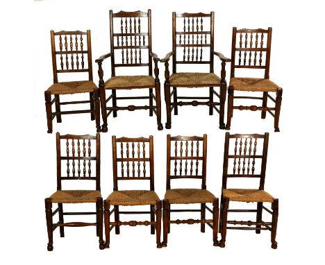 A Harlequin Set of Eight (6+2) Lancashire Ash Spindle-Back and Rush-Seat Dining Chairs, the carvers with triple spindle back 