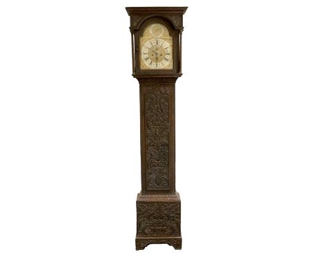 A Carved Oak Eight Day Longcase Clock, signed Hindley, York, 18th Century, later carved case with a flat top pediment, carved