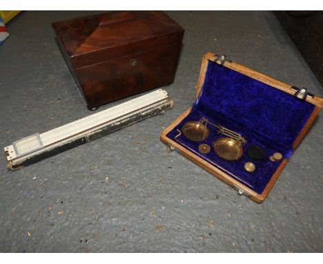 Tea Caddy, Jewellers Scales and Slide Rule 