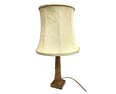 'Mouseman' oak table lamp, tapered octagonal form on carved square base, by Robert Thompson of Kilburn, H30cm (measurement ex