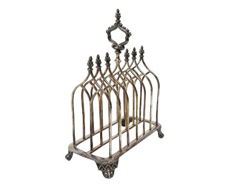 Victorian electroplate Gothic style toast rack, with seven arched bars, openwork handle and arcaded bracket feet, marks for J