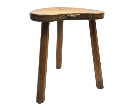 'Mouseman' oak three legged stool with kidney shaped dished seat, by Robert Thompson of Kilburn, 37cm x 30cm, H46cm - Conditi