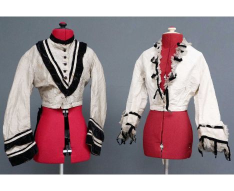 Late 19th Century White Silk Bodice with three quarter length flared sleeves, cuffs and v-neckline trimmed with white net and